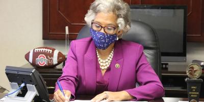 Congresswoman Betty wears mask while taking notes during constituent call during her Voting Rights and Equal Justice Forum.