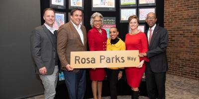 Congresswoman Beatty stands with "Rosa Parks Way" sign.