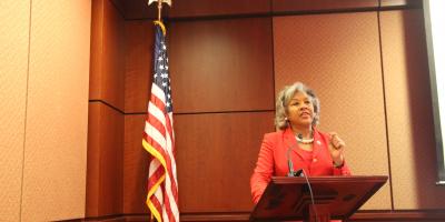 Congresswoman Beatty speaks before crowd at podium